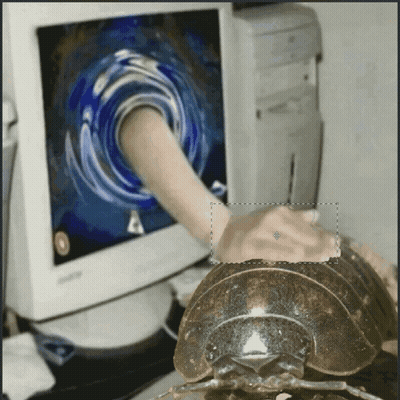 A Person 'S Hand Is Sticking Through A Computer Screen GIF