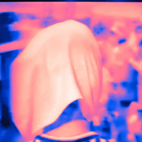 A Person 'S Head Is Visible In A Pink And Blue Image GIF