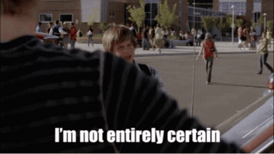 A Person Says I 'M Not Entirely Certain In Front Of A Crowd GIF