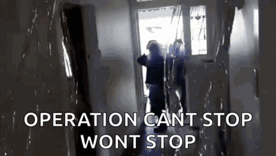 A Person Standing In A Hallway With The Words Operation Can 'T Stop Won 'T Stop On The Bottom GIF