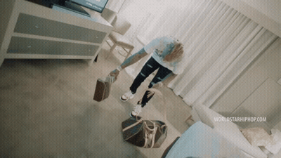 A Person Standing In A Room With A Worldstarhiphop.com Logo On The Bottom GIF