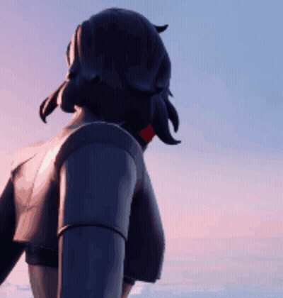 A Person Standing In Front Of A Blue Sky With A Sunset In The Background GIF