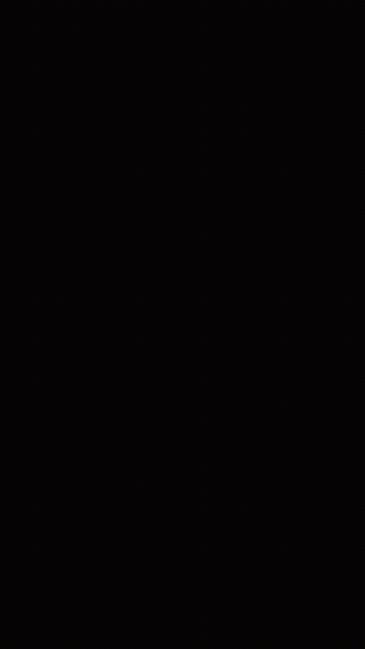 A Person Standing In Front Of A Cloudy Sky Covering Their Face GIF