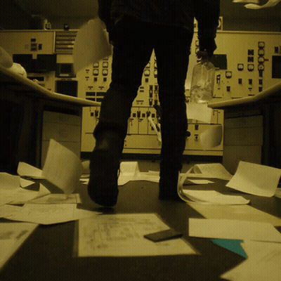 A Person Standing In Front Of A Control Panel That Has A Clock On It That Says ' Clock ' On It GIF