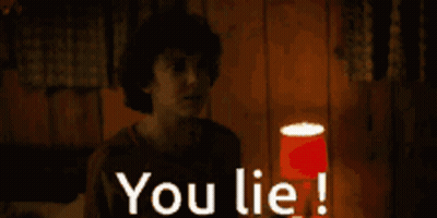 A Person Standing In Front Of A Red Cup That Says " You Lie " GIF