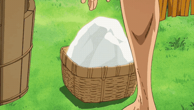 A Person Standing Next To A Basket Filled With Ice GIF