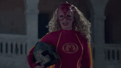 A Person Standing On Top Of A Blue Car With The Number 8 On It GIF