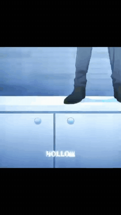 A Person Standing On Top Of A Cabinet With The Word Hollow In White GIF
