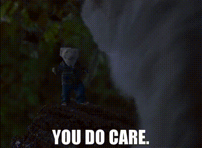A Person Standing On Top Of A Rock With The Words You Do Care Below Them . GIF