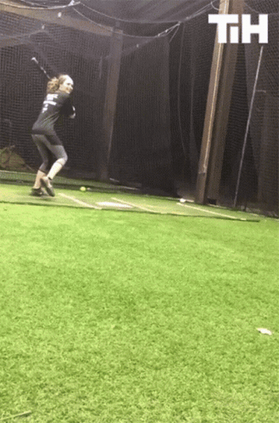 A Person Swinging A Bat With The Letters Th Above GIF