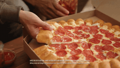 A Person Taking A Slice Of Pepperoni Pizza Out Of A Box GIF