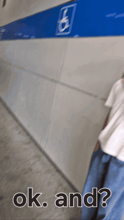 A Person Walking Down A Hallway With The Words Ok And GIF