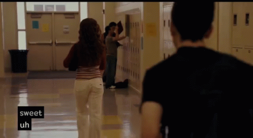 A Person Walking Down A Hallway With The Words Sweet Uh On The Bottom Right GIF