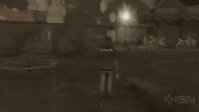 A Person Walking In A Dark Room With Ign On The Bottom GIF