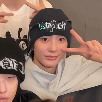 Person In Black Beanie With Jesus And Peace Sign GIF