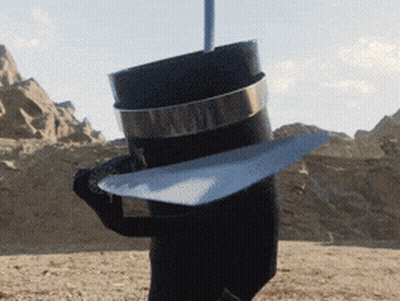 A Person Wearing A Black Hat With A Silver Band Around The Brim GIF