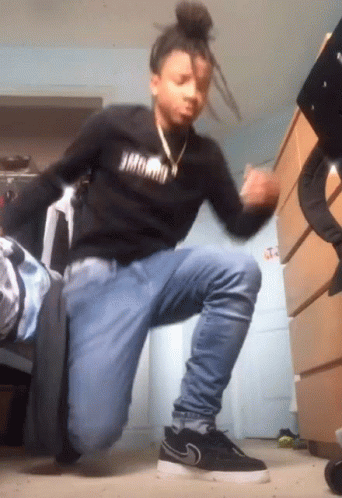 A Person Wearing A Black Shirt That Says ' Jmdmd ' On It GIF