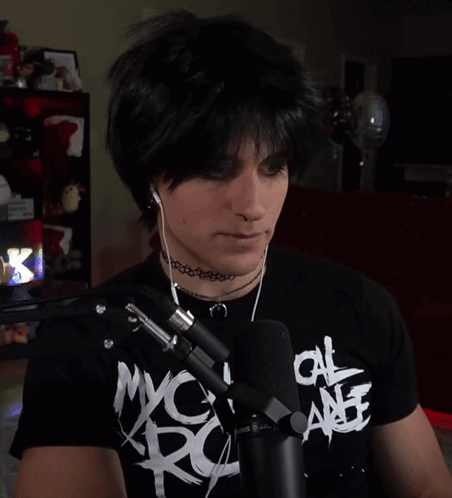 A Person Wearing A Black T-Shirt That Says Myca Rc GIF