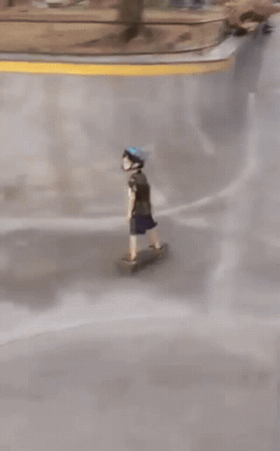 A Person Wearing A Blue Helmet Rides A Skateboard Down A Ramp GIF