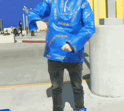 A Person Wearing A Blue Jacket With Ikea On It GIF