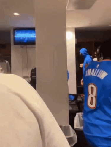 A Person Wearing A Blue Jersey With The Number 8 GIF