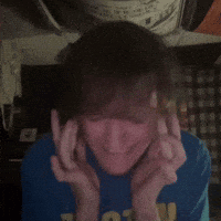 A Person Wearing A Blue Shirt With The Number 7 On It Is Holding A Stuffed Animal GIF