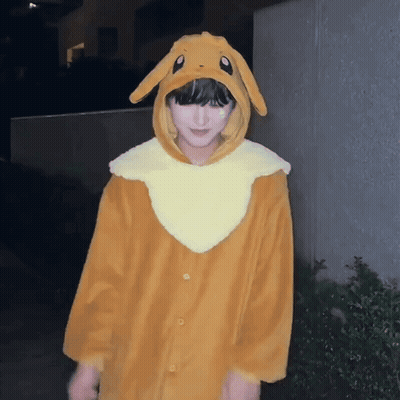 A Person Wearing A Bunny Costume With A Hood And Ears GIF