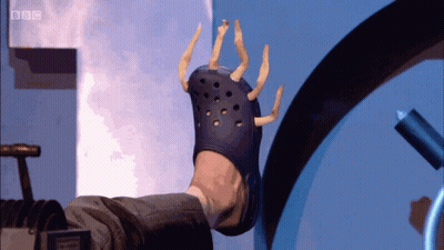 A Person Wearing A Croc With A Bbc Logo On The Bottom Right GIF