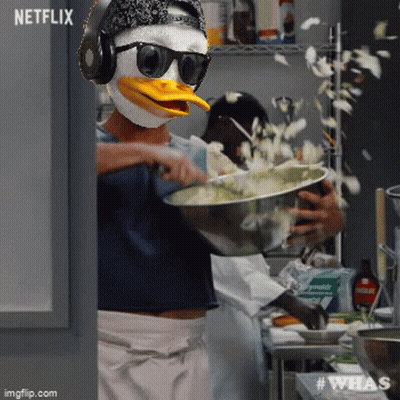 A Person Wearing A Duck Mask Is Preparing Food In A Kitchen With A Netflix Logo In The Background GIF