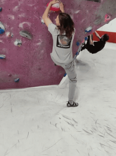 A Person Wearing A Grey Shirt That Says Enjoy The Moment On The Back GIF