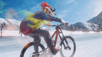 A Person Wearing A Helmet And Goggles Is Riding A Bike GIF