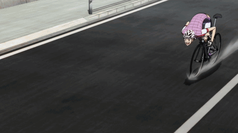A Person Wearing A Helmet Is Riding A Bike With The Word Fuji On The Shorts GIF