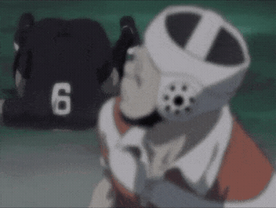 A Person Wearing A Helmet With The Number 6 On It Is Talking On A Cell Phone . GIF