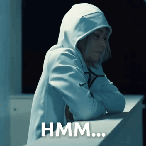 A Person Wearing A Hooded Sweatshirt With The Word Hmm Written On It GIF