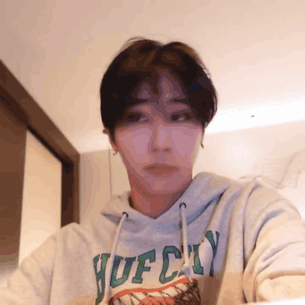 A Person Wearing A Hoodie With The Word Huf City On It GIF