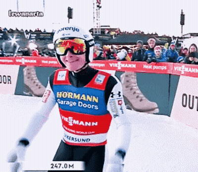 A Person Wearing A Jersey That Says Hormann Garage Doors On It GIF