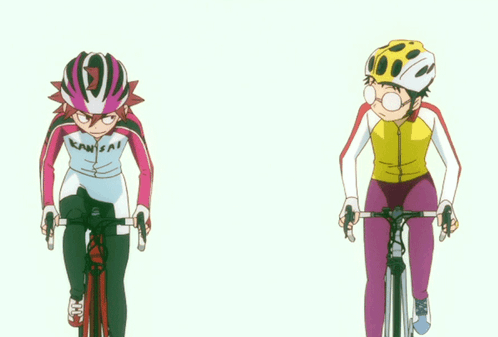 A Person Wearing A Kawasaki Shirt Is Riding A Bike Next To Another Person GIF