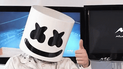 A Person Wearing A Marshmello Hat Gives A Thumbs Up GIF