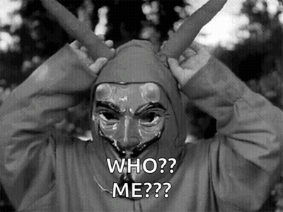 A Person Wearing A Mask And A Hood Says Who Me GIF