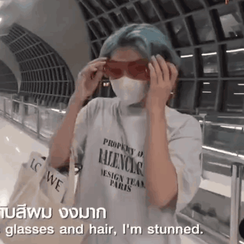 A Person Wearing A Mask And Sunglasses Is Stunned . GIF