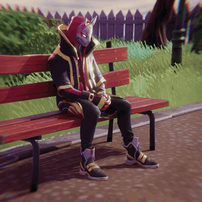 A Person Wearing A Mask Is Sitting On A Park Bench GIF