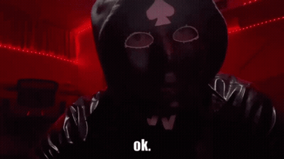A Person Wearing A Mask With A Spade On It Says " Ok " GIF