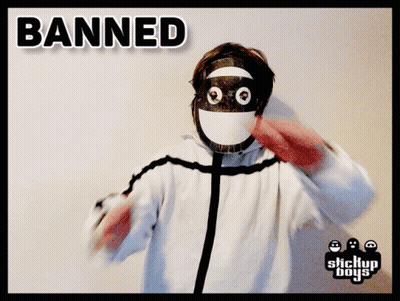A Person Wearing A Mask With The Word Banned Written On It GIF