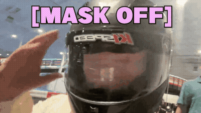 A Person Wearing A Motorcycle Helmet With The Words Mask Off Above It GIF