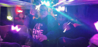A Person Wearing A No Time Shirt Is Dancing In A Club GIF