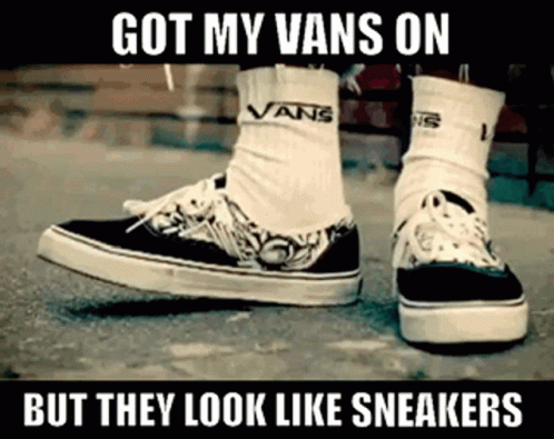 A Person Wearing A Pair Of Black And White Vans Shoes GIF