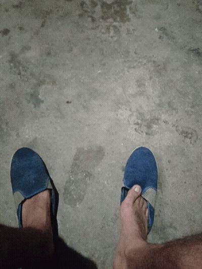 A Person Wearing A Pair Of Blue Shoes GIF