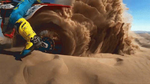 A Person Wearing A Pair Of Yellow Fox Boots Is Riding A Dirt Bike GIF