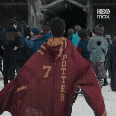 A Person Wearing A Red Cape That Says Potter On The Back GIF