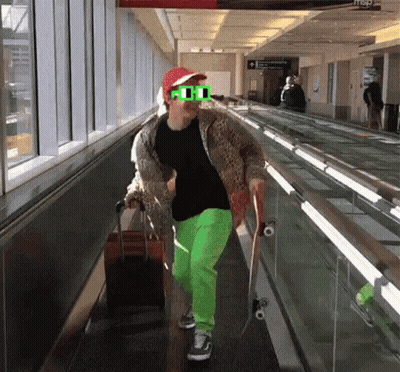 A Person Wearing A Red Hat And Green Sunglasses Is Walking Down An Escalator With A Suitcase And A Skateboard .. GIF